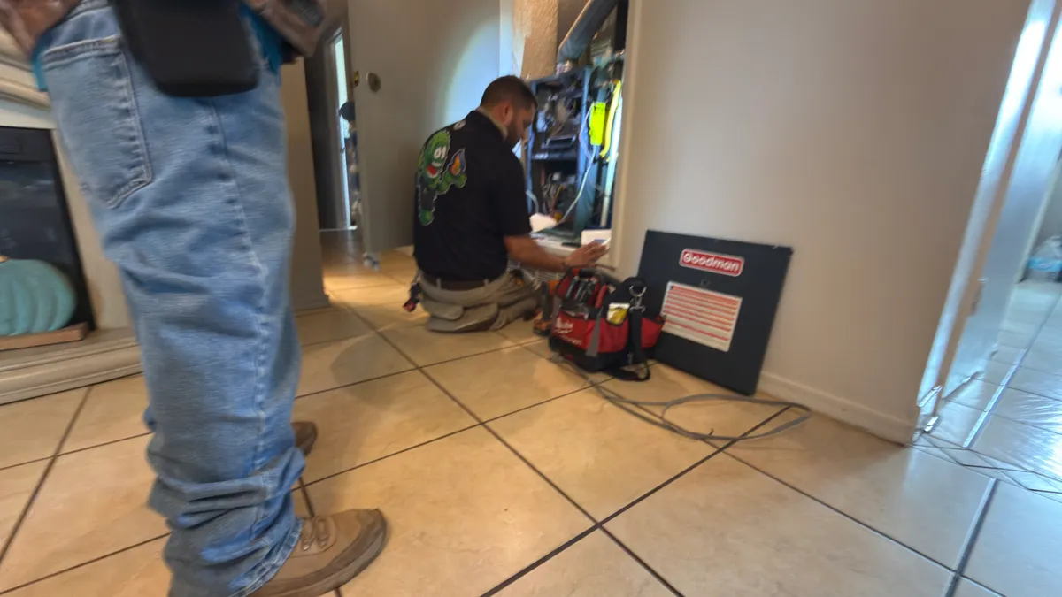 ABC Water & Air technician performing plumbing repair